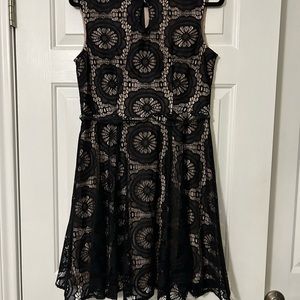 Black lace dress with neutral sheath under. Worn once for a wedding.